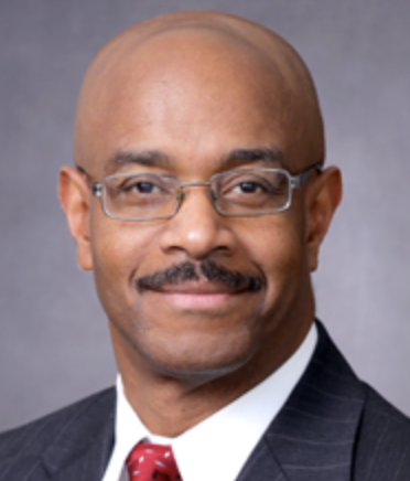 Dr Guy Hewlett